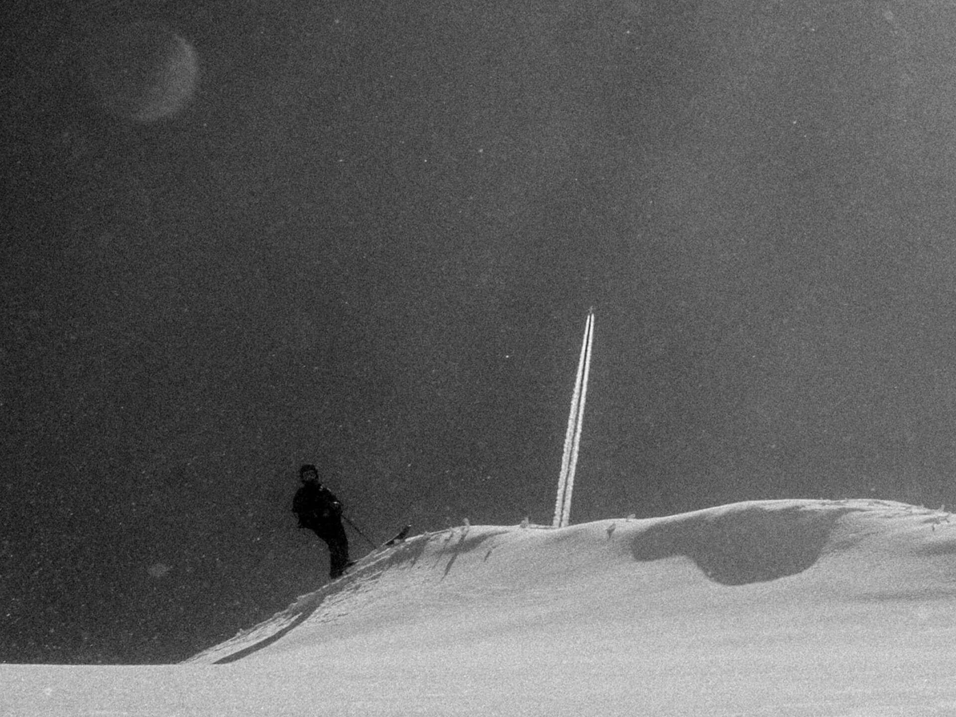 Skier on top of line before dropping